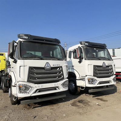 Segmento de caminhão pesado 6X4 60 toneladas Rhd Sinotruk HOWO Head Tractor Truck Manual Window